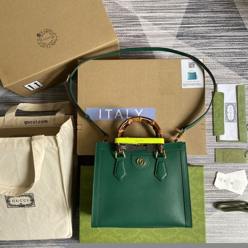 G*u*i top handle bags